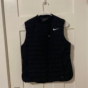 Black Nike golf vest